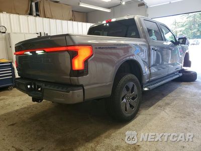 Trzecie zdjęcie samochodu z tyłu: 2023 FORD F150 LIGHTNING PRO VIN:1FT6W1EVXPWG21403 - miniatura