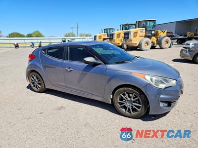 Czwarte zdjęcie samochodu z boku: 2016 HYUNDAI VELOSTER BASE VIN:KMHTC6AD6GU260586 - miniatura