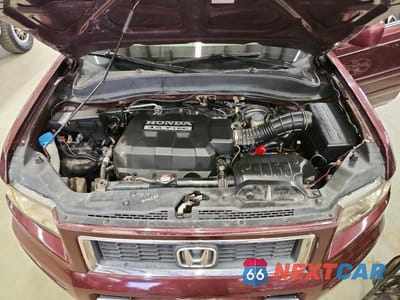Zdjęcie 11 z 12 samochodu: 2007 HONDA RIDGELINE RTX VIN:2HJYK16387H521232 - miniatura