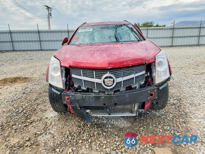 Piąte zdjęcie samochodu w środku: 2012 CADILLAC SRX VIN:3GYFNGE38CS528013 - miniatura