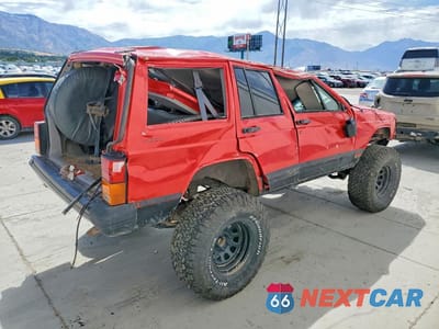 Trzecie zdjęcie samochodu z tyłu: 1996 JEEP CHEROKEE SPORT VIN:1J4FJ68S6TL131124 - miniatura