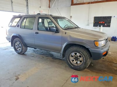 Czwarte zdjęcie samochodu z boku: 1999 NISSAN PATHFINDER XE VIN:JN8AR05Y0XW297288 - miniatura