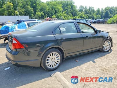 Trzecie zdjęcie samochodu z tyłu: 2010 FORD FUSION HYBRID VIN:3FADP0L30AR348875 - miniatura