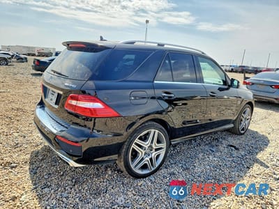 Trzecie zdjęcie samochodu z tyłu: 2015 MERCEDES-BENZ ML 63 AMG VIN:4JGDA7EB6FA567555 - miniatura