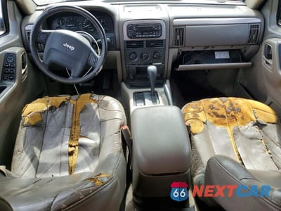 Zdjęcie 8 z 12 samochodu: 2003 JEEP GRAND CHEROKEE LAREDO VIN:1J4GX48N03C539023 - miniatura