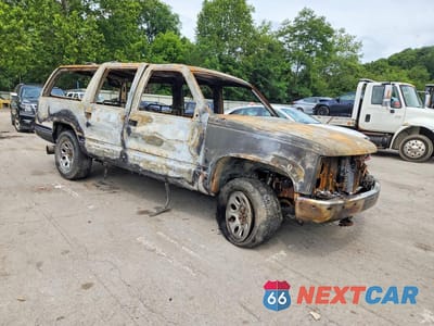 Czwarte zdjęcie samochodu z boku: 1995 CHEVROLET SUBURBAN K1500 VIN:1GNFK16K5SJ322625 - miniatura