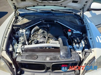 Zdjęcie 12 z 13 samochodu: 2013 BMW X5 XDRIVE35I VIN:5UXZV4C53D0B02441 - miniatura