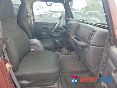 Zdjęcie 10 z 12 samochodu: 2002 JEEP WRANGLER / TJ SPORT VIN:1J4FA49S02P767418 - miniatura