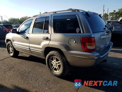 Drugie zdjęcie samochodu z przodu: 1999 JEEP GRAND CHEROKEE LIMITED VIN:1J4GW68N0XC527880 - miniatura