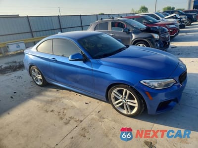 Czwarte zdjęcie samochodu z boku: 2015 BMW 228 I VIN:WBA1F5C51FV257426 - miniatura