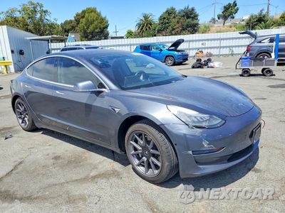 Czwarte zdjęcie samochodu z boku: 2020 TESLA MODEL 3 VIN:5YJ3E1EA5LF630382 - miniatura