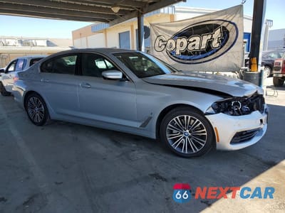 Czwarte zdjęcie samochodu z boku: 2019 BMW 530E VIN:WBAJA9C51KB254768 - miniatura