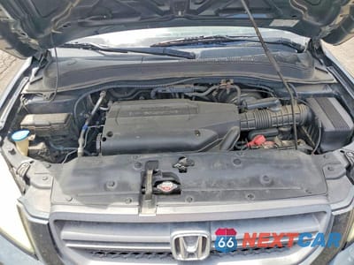 Zdjęcie 12 z 13 samochodu: 2004 HONDA PILOT EX VIN:2HKYF18454H560782 - miniatura