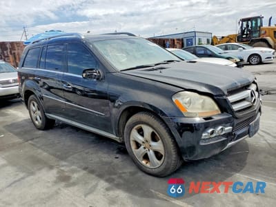Czwarte zdjęcie samochodu z boku: 2010 MERCEDES-BENZ GL 450 4MATIC VIN:4JGBF7BE1AA581881 - miniatura