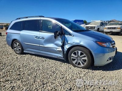 Czwarte zdjęcie samochodu z boku: 2014 HONDA ODYSSEY TOURING VIN:5FNRL5H99EB129846 - miniatura