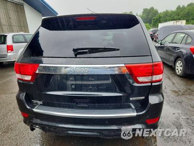 Zdjęcie 6 z 13 samochodu: 2013 JEEP GRAND CHEROKEE SRT-8 VIN:1C4RJFDJ9DC509907 - miniatura