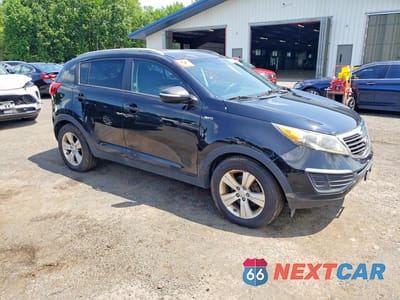 Czwarte zdjęcie samochodu z boku: 2013 KIA SPORTAGE LX VIN:KNDPBCA25D7354636 - miniatura