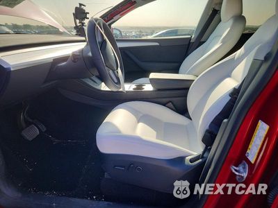 Zdjęcie 7 z 12 samochodu: 2024 TESLA MODEL Y VIN:7SAYGDED1RA319309 - miniatura