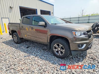 Czwarte zdjęcie samochodu z boku: 2015 CHEVROLET COLORADO Z71 VIN:1GCGTCE36F1182641 - miniatura