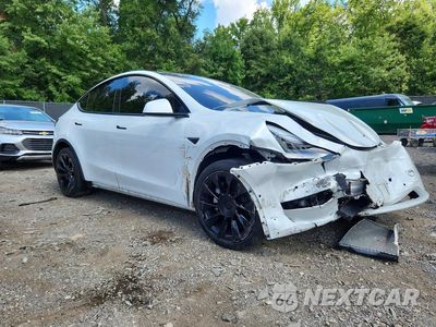 Czwarte zdjęcie samochodu z boku: 2020 TESLA MODEL Y VIN:5YJYGDEE8LF040598 - miniatura