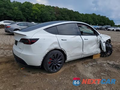 Trzecie zdjęcie samochodu z tyłu: 2023 TESLA MODEL Y VIN:7SAYGDEF1PF832951 - miniatura