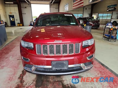 Piąte zdjęcie samochodu w środku: 2014 JEEP GRAND CHEROKEE SUMMIT VIN:1C4RJFJT4EC407938 - miniatura