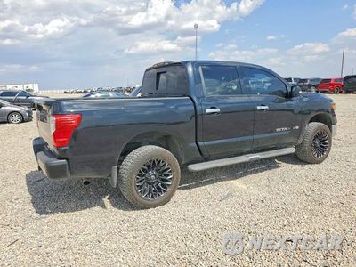 Trzecie zdjęcie samochodu z tyłu: 2019 NISSAN TITAN SV VIN:1N6AA1E5XKN507163 - miniatura