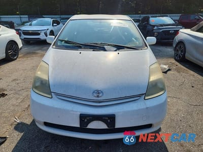 Piąte zdjęcie samochodu w środku: 2004 TOYOTA PRIUS BASE VIN:JTDKB22UX40080489 - miniatura