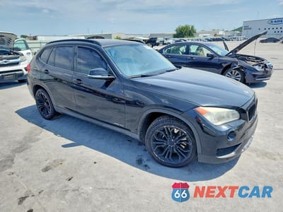 Czwarte zdjęcie samochodu z boku: 2014 BMW X1 XDRIVE35I VIN:WBAVM5C56EVV93210 - miniatura