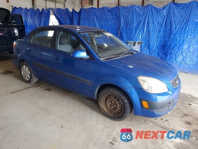 Czwarte zdjęcie samochodu z boku: 2009 KIA RIO BASE VIN:KNADE223796544993 - miniatura