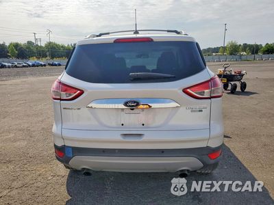 Zdjęcie 6 z 12 samochodu: 2015 FORD ESCAPE TITANIUM VIN:1FMCU9J90FUC05804 - miniatura
