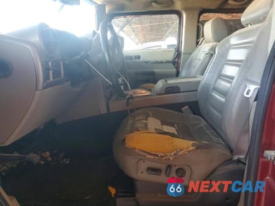 Zdjęcie 7 z 12 samochodu: 2003 HUMMER H2 VIN:5GRGN23U83H144409 - miniatura