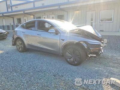Czwarte zdjęcie samochodu z boku: 2026 TESLA MODEL Y VIN:7SAYGDED0TA721829 - miniatura