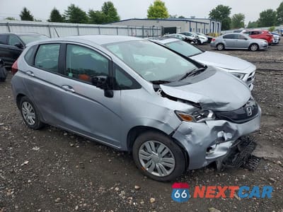 Czwarte zdjęcie samochodu z boku: 2017 HONDA FIT LX VIN:3HGGK5H56HM709631 - miniatura