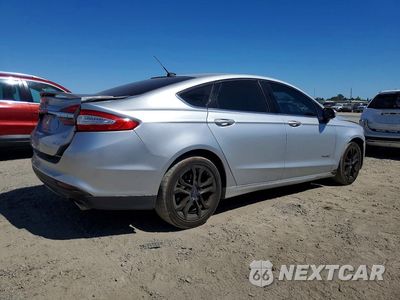 Trzecie zdjęcie samochodu z tyłu: 2018 FORD FUSION SE HYBRID VIN:3FA6P0LU2JR128672 - miniatura