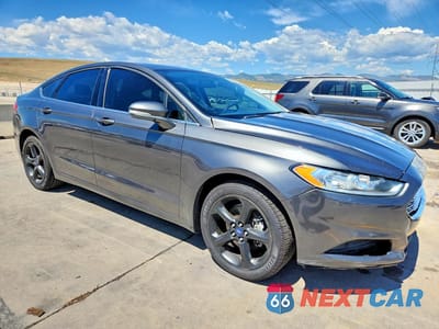Czwarte zdjęcie samochodu z boku: 2016 FORD FUSION SE VIN:3FA6P0H72GR114654 - miniatura