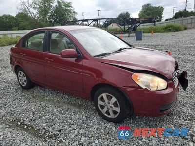 Czwarte zdjęcie samochodu z boku: 2010 HYUNDAI ACCENT GLS VIN:KMHCN4AC9AU428931 - miniatura