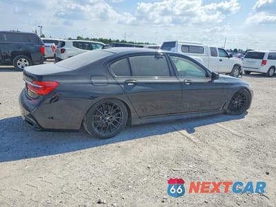 Trzecie zdjęcie samochodu z tyłu: 2018 BMW 750 XI VIN:WBA7F2C50JG424686 - miniatura