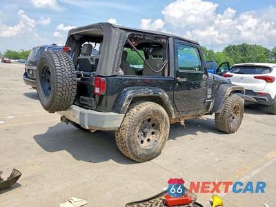 Trzecie zdjęcie samochodu z tyłu: 2009 JEEP WRANGLER SAHARA VIN:1J4FA54179L700644 - miniatura