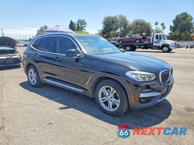 Czwarte zdjęcie samochodu z boku: 2020 BMW X3 XDRIVE30I VIN:5UXTY5C01L9B46052 - miniatura