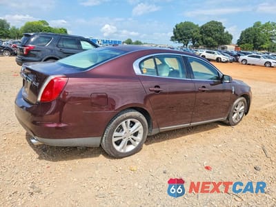 Trzecie zdjęcie samochodu z tyłu: 2009 LINCOLN MKS VIN:1LNHM93R69G605100 - miniatura