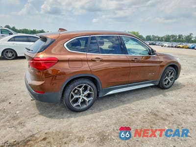 Trzecie zdjęcie samochodu z tyłu: 2017 BMW X1 SDRIVE28I VIN:WBXHU7C3XH5H32940 - miniatura