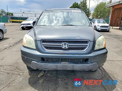 Piąte zdjęcie samochodu w środku: 2004 HONDA PILOT EX VIN:2HKYF18454H560782 - miniatura
