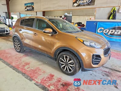 Czwarte zdjęcie samochodu z boku: 2017 KIA SPORTAGE EX VIN:KNDPNCAC9H7032037 - miniatura