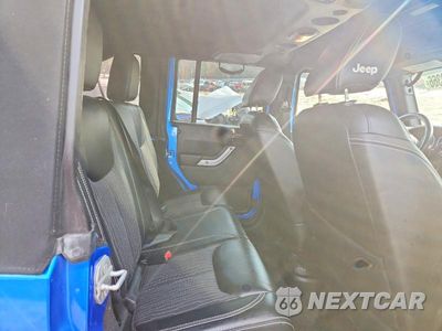 Zdjęcie 11 z 13 samochodu: 2015 JEEP WRANGLER UNLIMITED SPORT VIN:1C4BJWDGXFL625044 - miniatura
