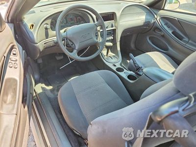 Zdjęcie 8 z 13 samochodu: 2003 FORD MUSTANG VIN:1FAFP40433F332022 - miniatura