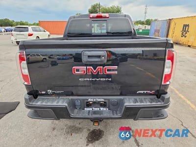 Zdjęcie 6 z 13 samochodu: 2022 GMC CANYON AT4 VIN:1GTG6FEN1N1327917 - miniatura