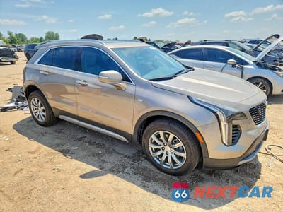 Czwarte zdjęcie samochodu z boku: 2023 CADILLAC XT4 PREMIUM LUXURY VIN:1GYFZDR4XPF143567 - miniatura