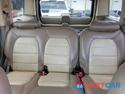 Zdjęcie 10 z 13 samochodu: 2002 FORD EXPLORER EDDIE BAUER VIN:1FMZU74KX2UD46256 - miniatura