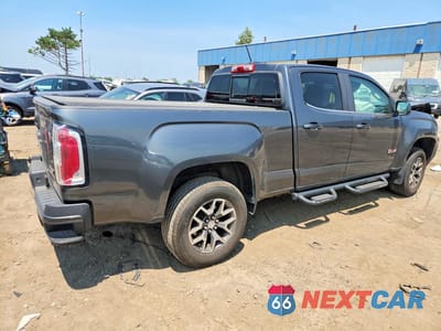 Trzecie zdjęcie samochodu z tyłu: 2016 GMC CANYON SLE VIN:1GTG6CE33G1250032 - miniatura